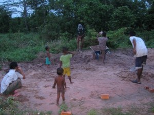 The residents helping to put soil